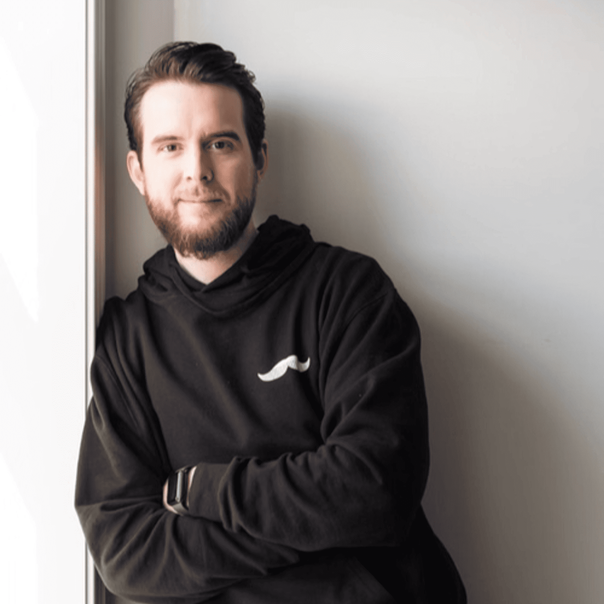 Portrait of Jon, a professional stylist at Revolutions Salon, showcasing their expertise and style.